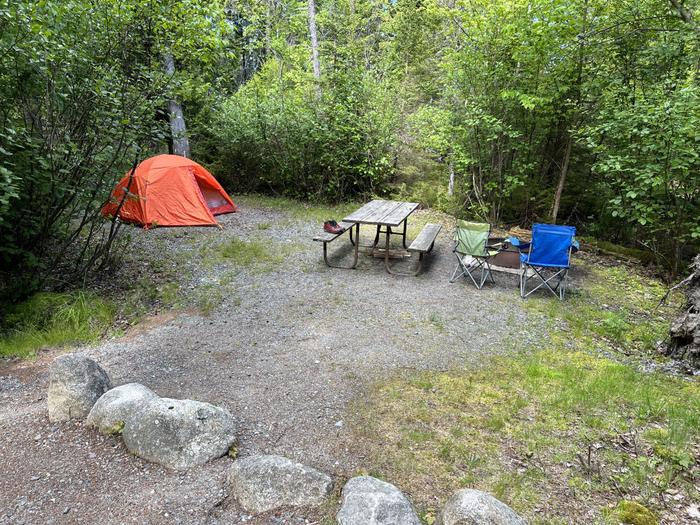 Site B4 with a small tent