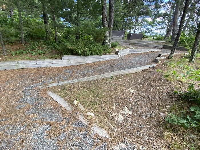 R26 - Sunrise Point, view of access trail to campsite with a gradual gravel slope.Access to campsite