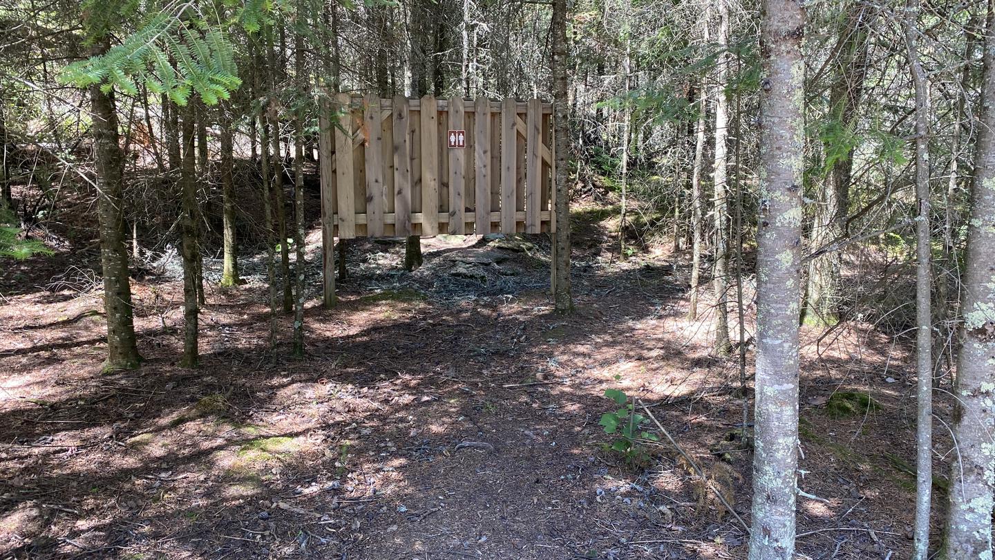 R54 -  Beaver Lodge, view of the privacy guard for the privy.Privacy guard