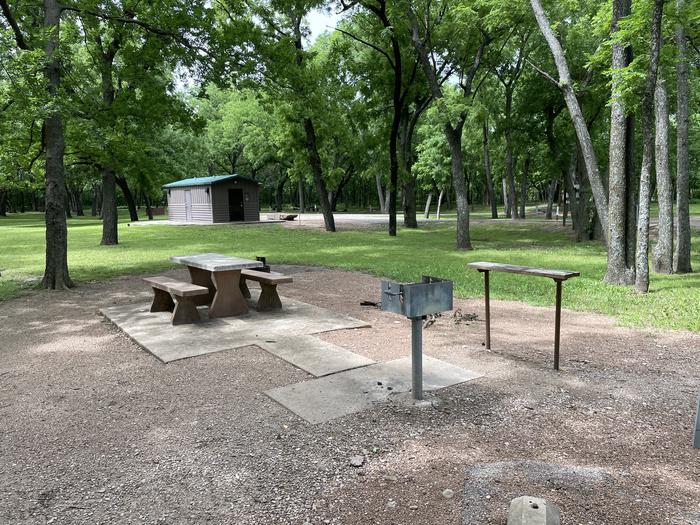 A photo of Site 12 of Loop Main at Sandy Park with Boat Ramp, Picnic Table, Electricity Hookup, Fire Pit, Shade, Tent Pad, Water Hookup