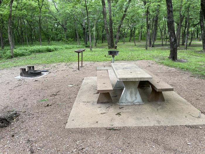 A photo of Site 6 of Loop Main at Sandy Park with Boat Ramp, Picnic Table, Electricity Hookup, Fire Pit, Shade, Tent Pad, Water Hookup