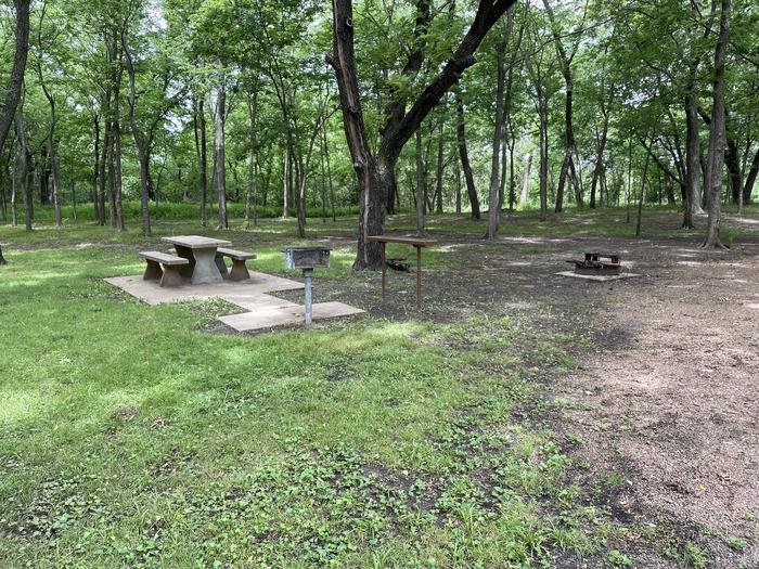 A photo of Site 4 of Loop Main at Sandy Park with Boat Ramp, Picnic Table, Electricity Hookup, Fire Pit, Shade, Tent Pad, Water Hookup