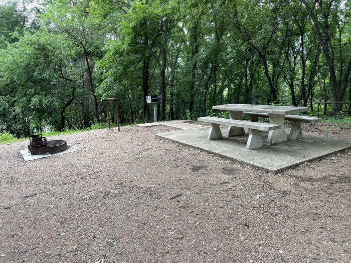 A photo of Site 1 of Loop Main at Sandy Park with Picnic Table, Electricity Hookup, Fire Pit, Shade, Tent Pad, Water Hookup