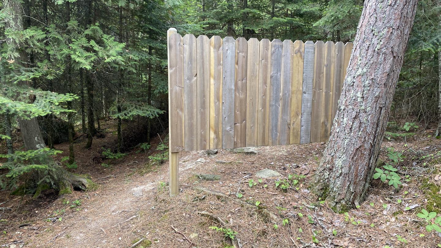 R73 - Dryweed Island North, wooden privacy guard for the privy at campsite.Privacy guard for privy