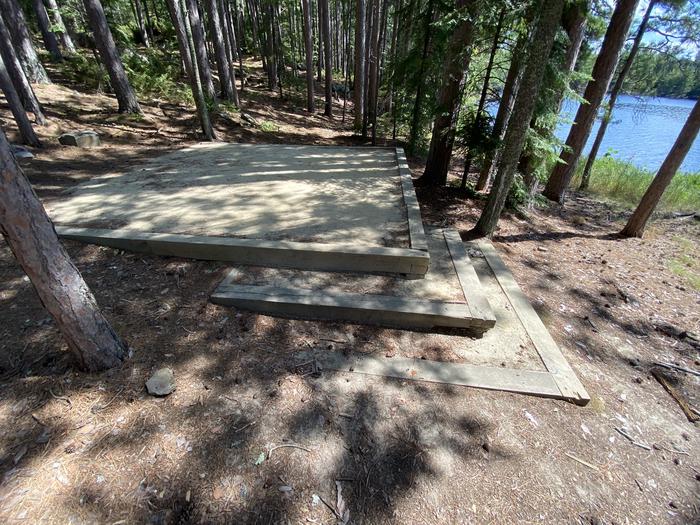 R91 - Kempton Entrance East, tent pad with steps at campsite.Tent pad with steps