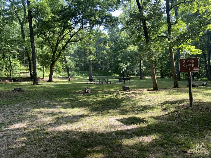 A photo of Site G03 of Loop Chub Hollow/Groupsite #3 at BIG SPRING with Picnic Table, Fire Pit, Shade, Waterfront, Lantern Pole, Charcoal Grills
