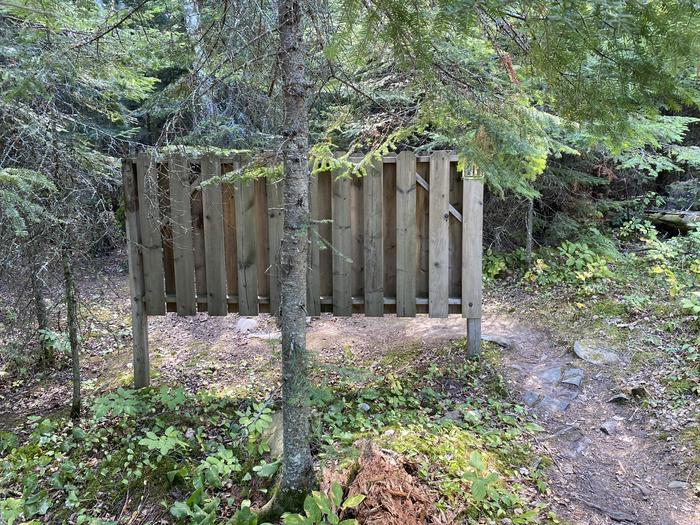 R103 - Pine Island View, privacy guard of privy at campsite.Privacy guard of privy