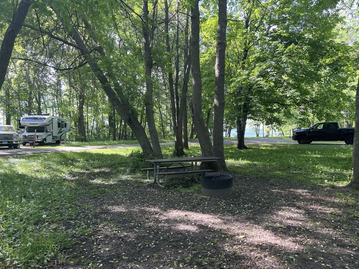 A photo of Site 022 of Loop STON at STONY POINT with Picnic Table, Fire Pit, Shade