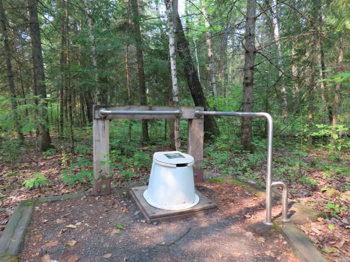 N41 - Voyageurs Narrows, privy with hand rails at campsite.Privy
