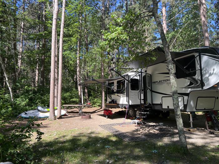 A photo of Site 023 of Loop MIDD at ONEGUME with Picnic Table, Electricity Hookup, Fire Pit, Shade