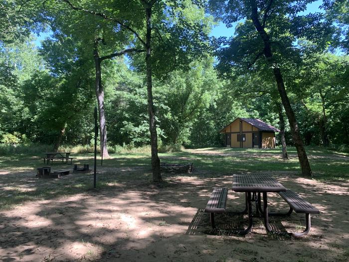 A photo of Site G03 of Loop Alley Spring Group Sites at ALLEY SPRING with Picnic Table, Fire Pit, Shade, Lantern Pole
