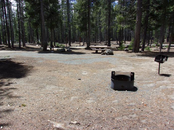 Picnic table, grill, fire ring.Site #12 at Medicine Lake Campground