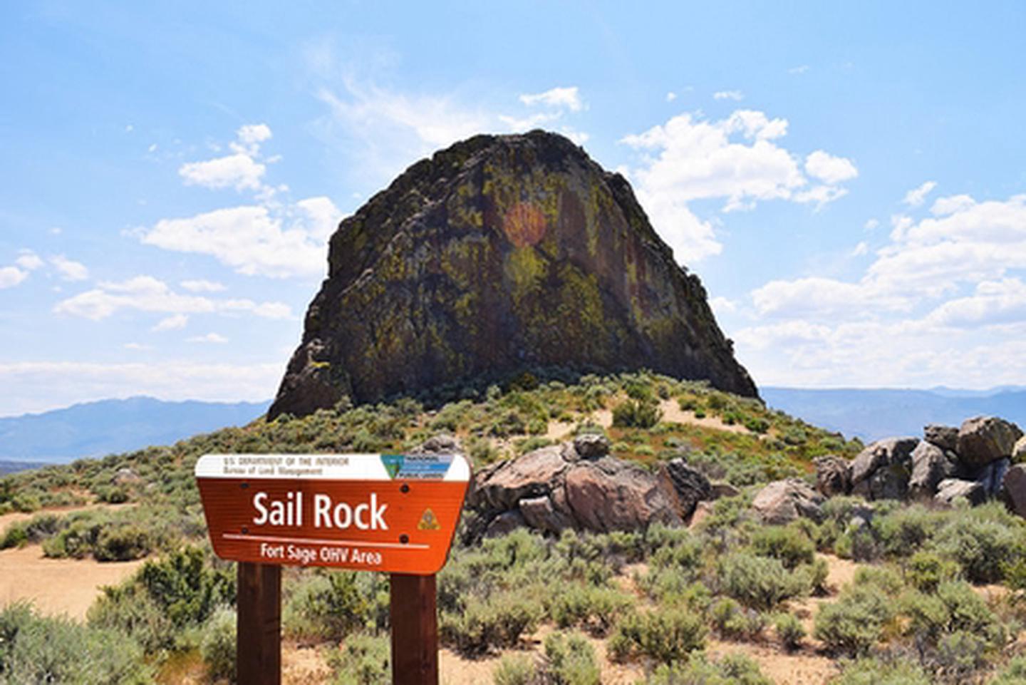 Fort Sage OHV Area- Sail RockSign that reads Sail Rock, Fort Sage OHV Area with sail rock behind the sign at the Fort Sage OHV Area.