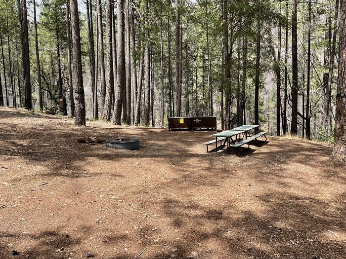 A photo of Site 004 of Loop SHEEP CAMP PRIMITIVE CAMPGROUND at SHEEP CAMP PRIMITIVE CAMPGROUND with Picnic Table, Fire Pit, Shade, Food Storage, Lantern Pole