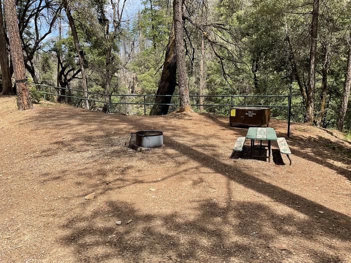 A photo of Site 002 of Loop SHEEP CAMP PRIMITIVE CAMPGROUND at SHEEP CAMP PRIMITIVE CAMPGROUND with Picnic Table, Fire Pit, Shade, Food Storage, Lantern Pole