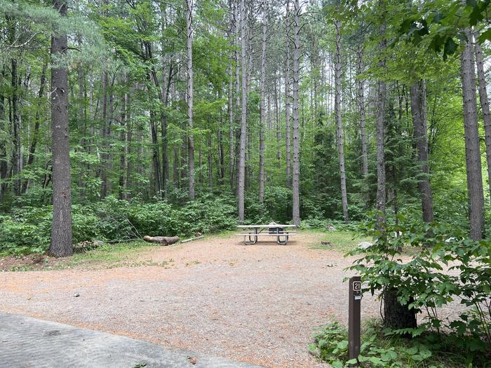 A photo of Site 021 of Loop BOOT LAKE CAMPGROUND at BOOT LAKE CAMPGROUND with Picnic Table, Fire Pit, Shade