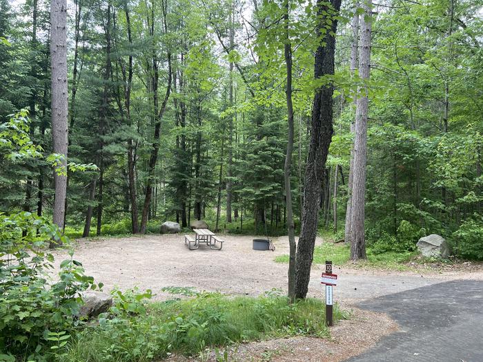 A photo of Site 010 of Loop BOOT LAKE CAMPGROUND at BOOT LAKE CAMPGROUND with Picnic Table, Fire Pit, Shade