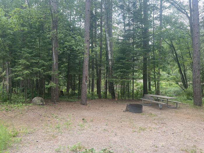 A photo of Site 005 of Loop BOOT LAKE CAMPGROUND at BOOT LAKE CAMPGROUND with Picnic Table, Fire Pit, Shade