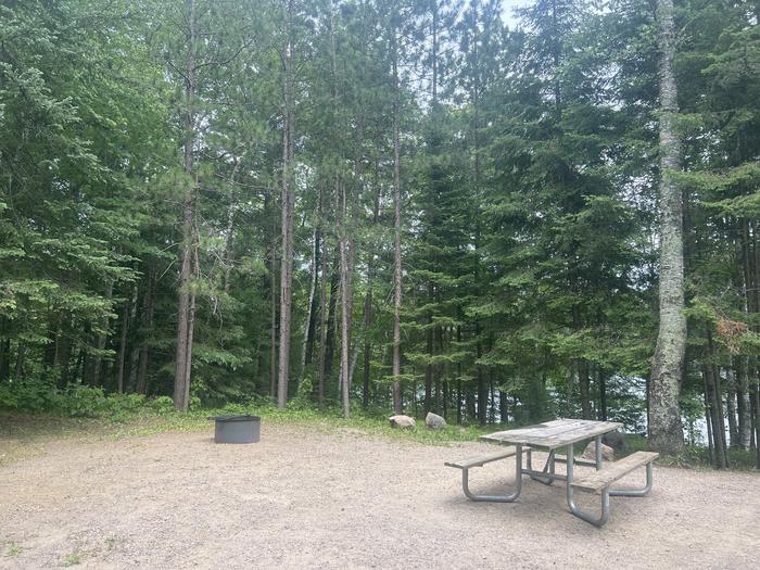 A photo of Site 006 of Loop BOOT LAKE CAMPGROUND at BOOT LAKE CAMPGROUND with Picnic Table, Fire Pit, Shade