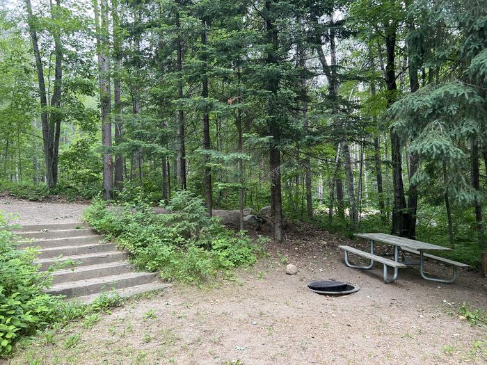 A photo of Site 025 of Loop BOOT LAKE CAMPGROUND at BOOT LAKE CAMPGROUND with Picnic Table, Fire Pit, Shade