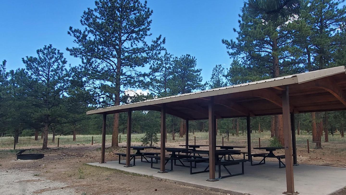 Pulver Group SiteThe pavilion provides several moveable tables with a large firepit and a double-vault toilet