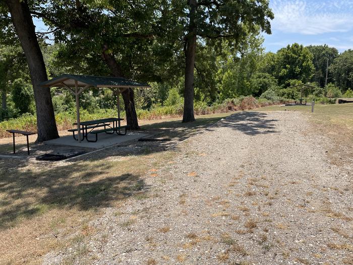 A photo of Site A02 of Loop A at BUNCOMBE CREEK with Picnic Table, Electricity Hookup, Fire Pit, Water Hookup
