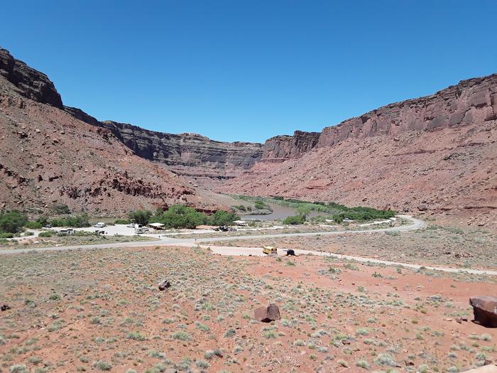 Broad view of Big Bend Campground with Colorado River and red rock canyon walls