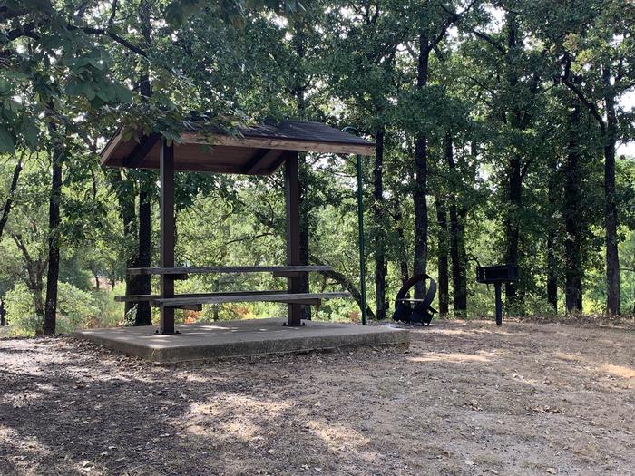 A photo of Site 065 of Loop HICKORY CREEK  at HICKORY CREEK with Boat Ramp, Picnic Table, Electricity Hookup, Fire Pit, Shade, Lantern Pole, Water Hookup