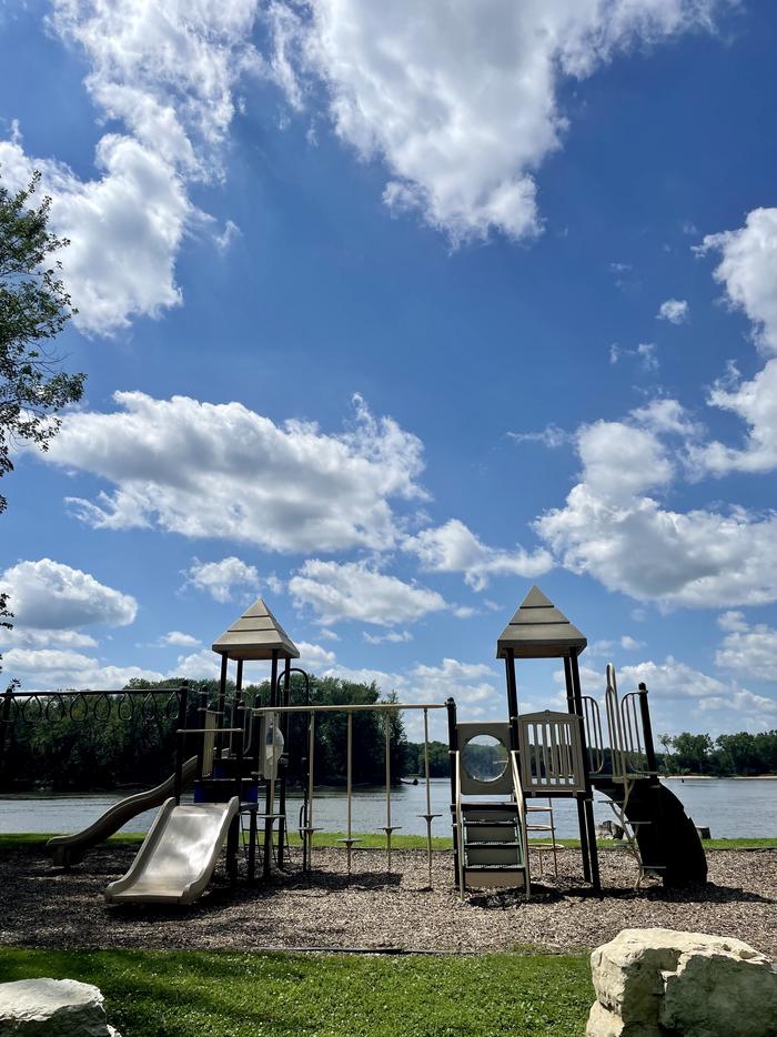 A photo of playground at Upper Loop at Blackhawk Park.A photo of playground at Upper Loop at Blackhawk Park. Near shoreline, boat launch, and pit vault toilets near Site 2.