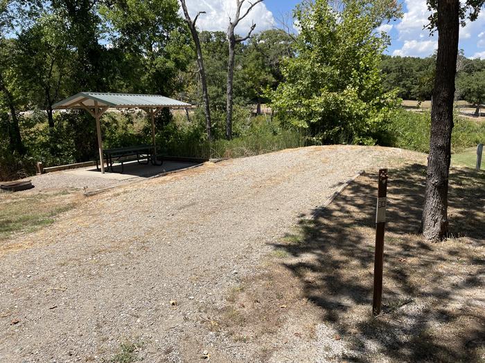 A photo of Site B06 of Loop B at BUNCOMBE CREEK with Picnic Table, Electricity Hookup, Fire Pit, Shade, Water Hookup