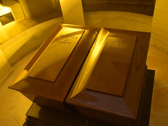 Ulysses and Julia's red granite sarcophagi  with their names engraved on the lids.Ulysses and Julia Grant are interred on the crypt level of the mausoleum.