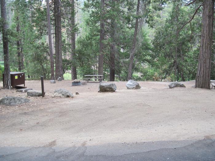 Back-in parking on dirt and gravel.