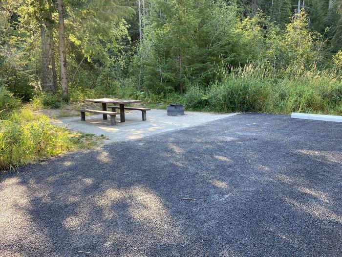 A photo of Site A012 of Loop A at KIT PRICE with Picnic Table, Fire Pit, Shade