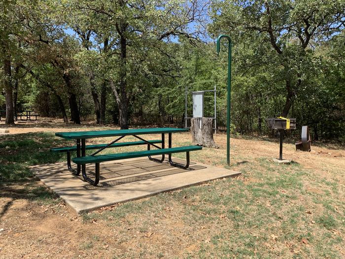 A photo of Site 116 of Loop HICKORY CREEK at HICKORY CREEK with Boat Ramp, Picnic Table, Electricity Hookup, Fire Pit, Shade, Lantern Pole, Water Hookup