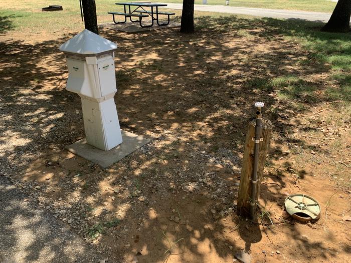 A photo of Site 109 of Loop HICKORY CREEK at HICKORY CREEK with Boat Ramp, Picnic Table, Electricity Hookup, Fire Pit, Shade, Lantern Pole, Water Hookup