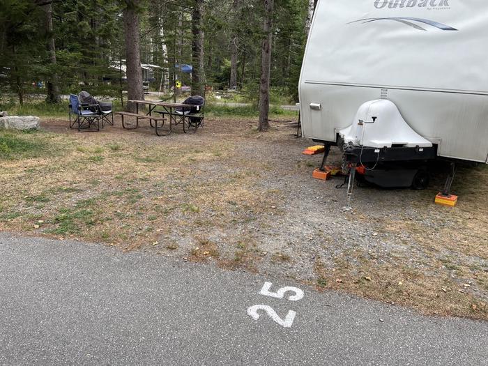Site C25 with RV and picnic table