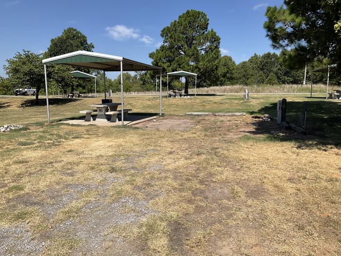 A photo of Site 90 of Loop Sailboat at Walnut Creek  with Picnic Table, Electricity Hookup, Fire Pit, Water Hookup, Lean To / Shelter