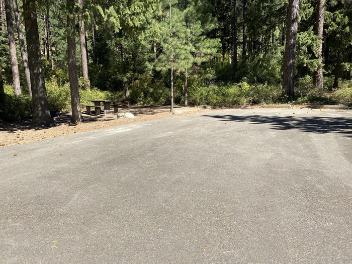 A photo of Site 014 of Loop Lower at BELL BAY CAMPGROUND with Picnic Table, Fire Pit, Shade