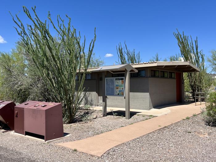 One bathroom at TWIN PEAKS CAMPGROUND with garbage receptacles and an ocotillo.One of the six bathrooms at TWIN PEAKS CAMPGROUND with garbage receptacles and an ocotillo.