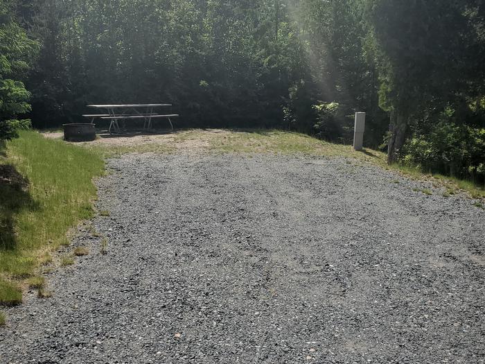 A photo of Site A21 of Loop A-Loop at Schoodic Woods Campground with Picnic Table, Electricity Hookup, Fire Pit