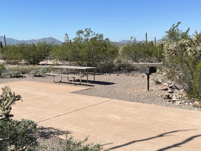 A photo of Site 027 of Loop RV Generator at TWIN PEAKS CAMPGROUND with Picnic Table