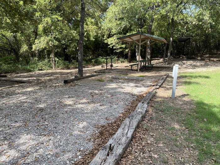 A photo of Site A14 of Loop A at CANEY CREEK with Picnic Table, Electricity Hookup, Fire Pit, Shade, Water Hookup