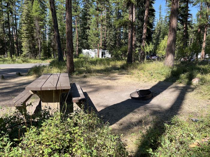 A photo of Site RPS04 at River Point Lolo Campground (MT) with Picnic Table, Fire Pit, Tent PadA photo of Site RPS04 at River Point Lolo Campground (MT) with Picnic Table, Fire Pit, Tent Pad.