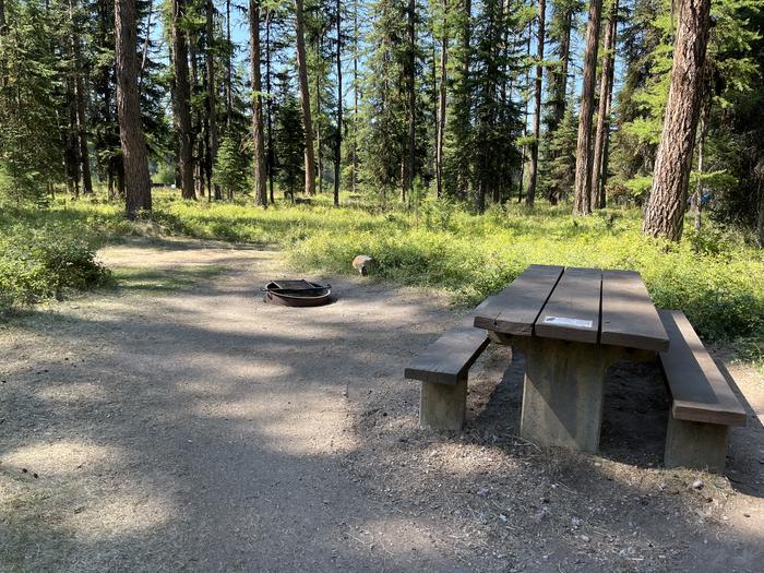 A photo of Site RPS05 at River Point Lolo Campground (MT) with Picnic Table, Fire Pit, Tent PadA photo of Site RPS05 at River Point Lolo Campground (MT) with Picnic Table, Fire Pit, Tent Pad.