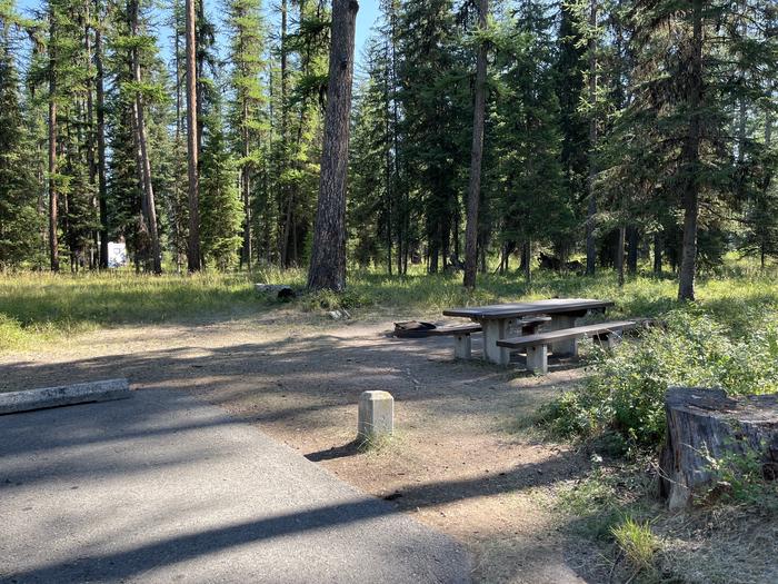 A photo of Site RPS18 at River Point Lolo Campground (MT) with Picnic Table, Fire Pit, Tent PadA photo of Site RPS18 at River Point Lolo Campground (MT) with Picnic Table, Fire Pit, Tent Pad.