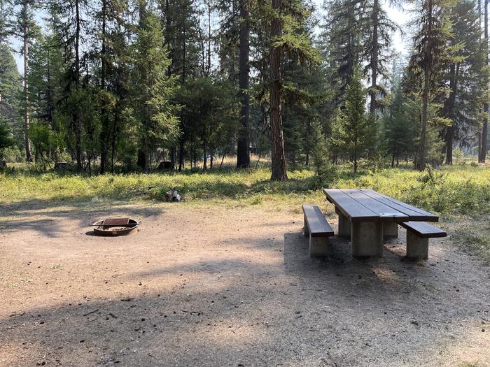 A photo of Site RPS27 at River Point Lolo Campground (MT) with Picnic Table, Fire Pit, Tent PadA photo of Site RPS27 at River Point Lolo Campground (MT) with Picnic Table, Fire Pit, Tent Pad.
