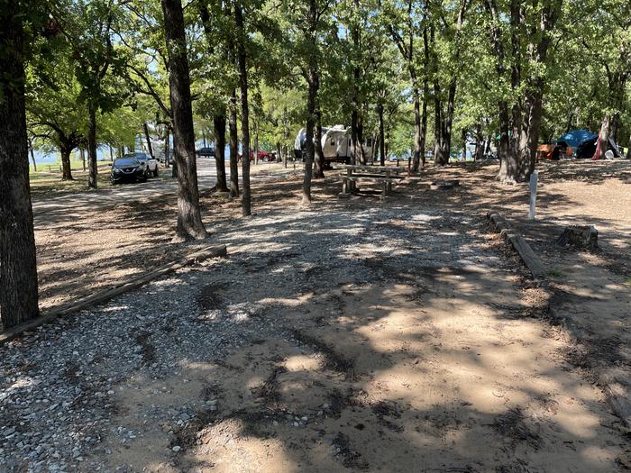 A photo of Site B23 of Loop B at PLATTER FLATS with Picnic Table, Electricity Hookup, Fire Pit, Shade, Waterfront, Water Hookup