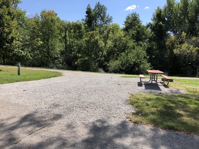 A photo of Site 026 of Loop  at SUGAR BOTTOM CAMPGROUND with Picnic Table, Electricity Hookup, Fire Pit