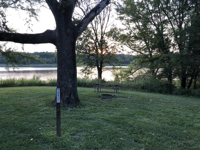 A photo of Site 100 of Loop  at SUGAR BOTTOM CAMPGROUND with Picnic Table, Fire Pit, Waterfront