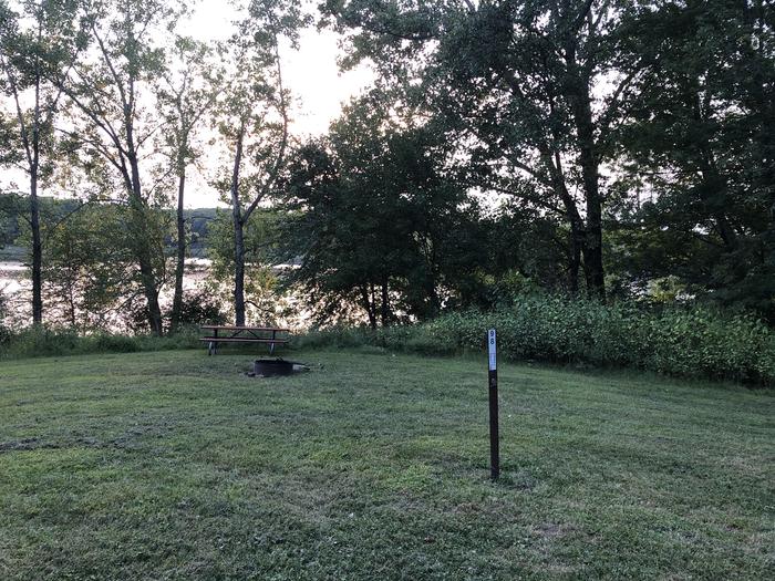 A photo of Site 098 of Loop  at SUGAR BOTTOM CAMPGROUND with Picnic Table, Fire Pit, Waterfront